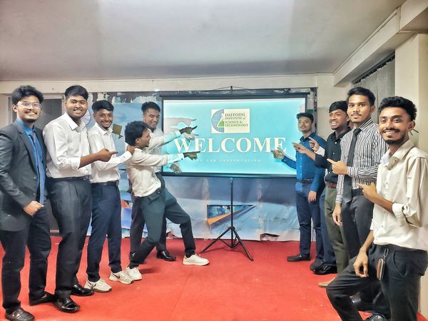 A vibrant presentation session at DIST, filled with enthusiasm and camaraderie.